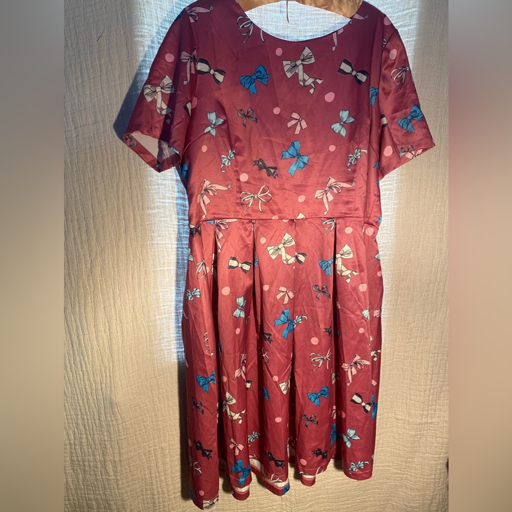 Women’s size 16 dusty rose bow print dress